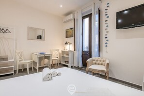 1 chambre, coffres-forts dans les chambres, fer et planche à repasser