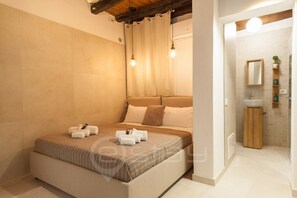 1 slaapkamer, een strijkplank/strijkijzer, wifi, beddengoed