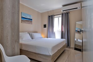 Apartment 5 Conch | Premium bedding, in-room safe, blackout curtains, iron/ironing board - Little Sea (Noord)