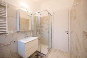 Basic Apartment | Bathroom | Shower, bidet, towels, soap