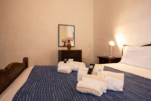 1 bedroom, travel cot, bed sheets
