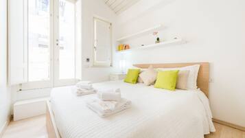 1 bedroom, desk, iron/ironing board, travel crib