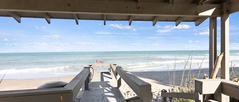 On the beach, sun loungers, beach towels