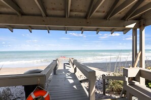 On the beach, sun loungers, beach towels