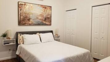 1 bedroom, desk, iron/ironing board, travel cot