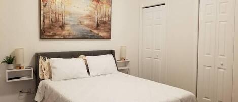 1 bedroom, desk, iron/ironing board, travel cot