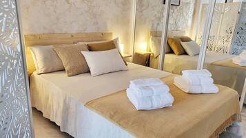 Tabla de planchar con plancha, wifi gratis, ropa de cama