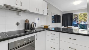 Full-sized fridge, microwave, stovetop, toaster