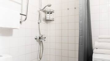 Appartement | Badkamer | Een haardroger, zeep