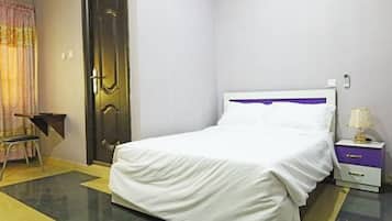 Habitación superior | Ropa de cama de alta calidad y decoración individual