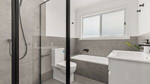 Bathtub, hair dryer, towels