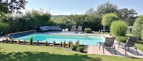 Alberca al aire libre y alberca climatizada