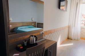 Desk, free WiFi, bed sheets