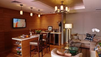 Riverview Suite with Stunning RiverViews | Living area | 50-inch flat-screen TV with cable channels, TV