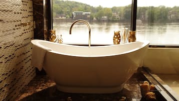 Riverview Suite with Stunning RiverViews | Bathroom | Bathtub, free toiletries, hair dryer, dressing gowns