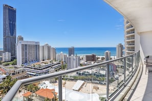 Enjoy breathtaking views of the city and ocean from this high-rise building's expansive windows.