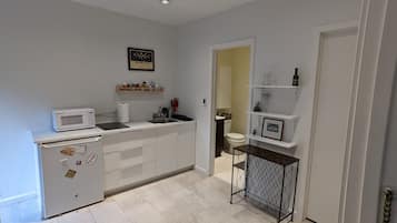 Fridge, microwave, stovetop, coffee/tea maker