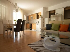 Apartment (Two Bedroom Apartment with Terrace an) | Living room | TV