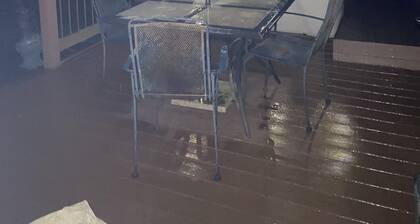 2 BR, 1-1/2 bath house in wooded setting with private back yard, deck, hot tub.