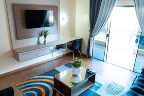 Suite studio exécutive, 1 grand lit | Aire de séjour