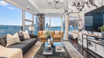 Luxury Apartment, 2 Bedrooms, Balcony, Lake View | Living area | 55-inch LED TV with digital channels, TV, offices