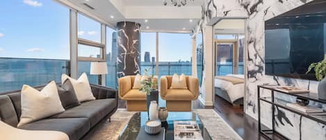 Luxury Apartment, 2 Bedrooms, Balcony, Lake View | Living area | 55-inch LED TV with digital channels, TV, offices