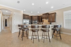 Fridge, microwave, oven, stovetop - Fairway Haven: Theater, Themed Bedrooms, Golf View, Grill, Water Park, Near Disney (Kissimmee)