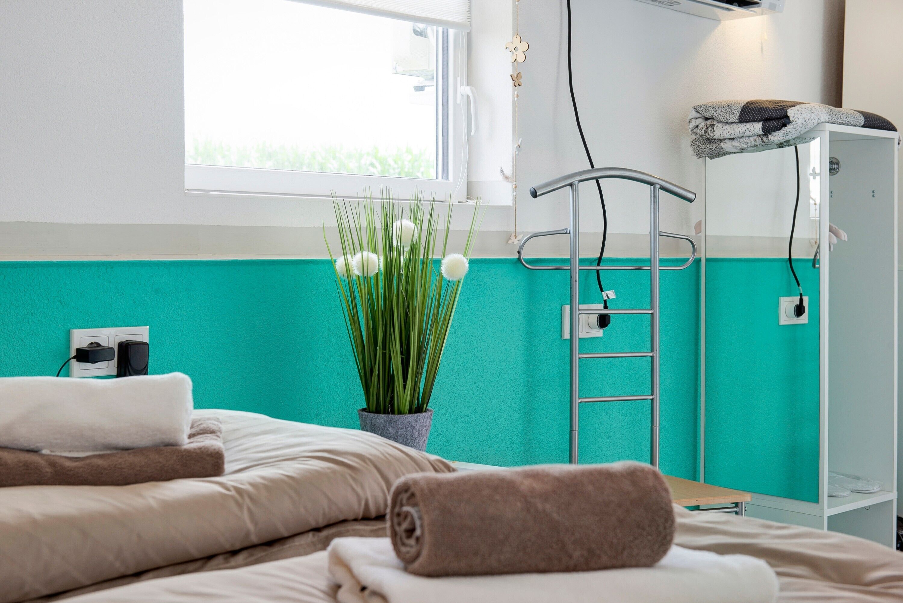 1 室のベッドルーム、WiFi (無料)、ベッドシーツ