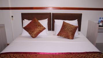 Egyptian cotton sheets, premium bedding, down duvets, pillow-top beds