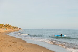 On the beach, beach towels