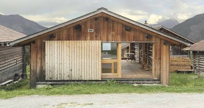 Stylish architectâs hut at the ski lift