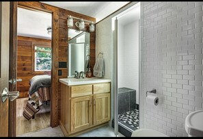 Shower, hair dryer, towels, toilet paper - Cozy Log Cabin with Hot Tub (Champion)
