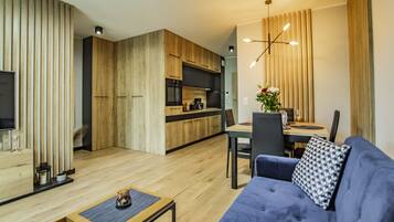 Deluxe-Apartment | Wohnzimmer | 42-Zoll-Flachbildfernseher mit Digitalempfang, Fernseher