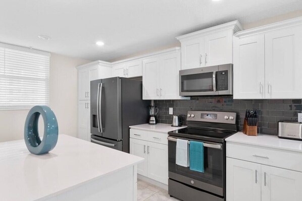 Fridge, microwave, oven, stovetop