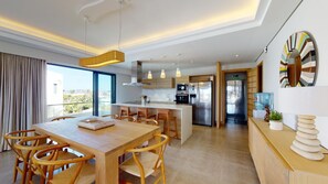 Dining - Penthouse with lagoon pool 100m from the beach. (Mont Choisy)