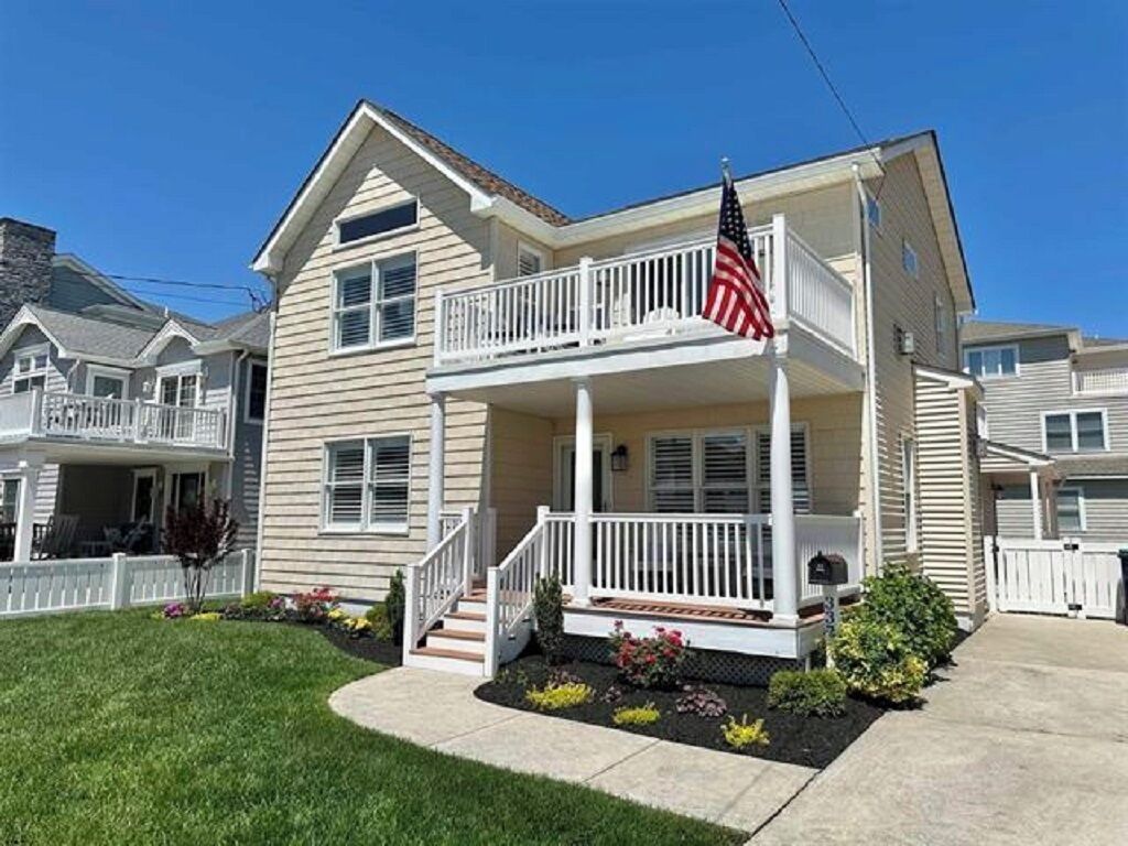 Only 3 Homes to the BEACH located in the Center of Town !