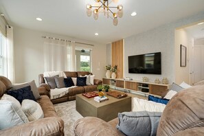 Een smart-tv, tafelvoetbal en een tafeltennistafel