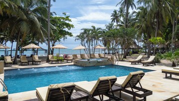 Outdoor pool, open 7:00 AM to 10:00 AM, pool loungers