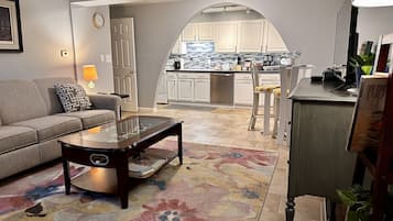 Smart TV, foosball, books, music library