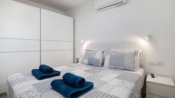 1 dormitorio, tabla de planchar con plancha, wifi gratis y ropa de cama
