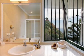 Bathtub, hair dryer, towels