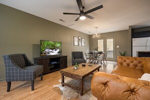 TV, offices - Spring Escape | Cozy 2BR w Hot Tub & Arcade awaits (Sevierville)