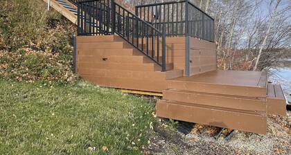 Large family or group vacation lake home with dock and boats 35 minutes from WEM