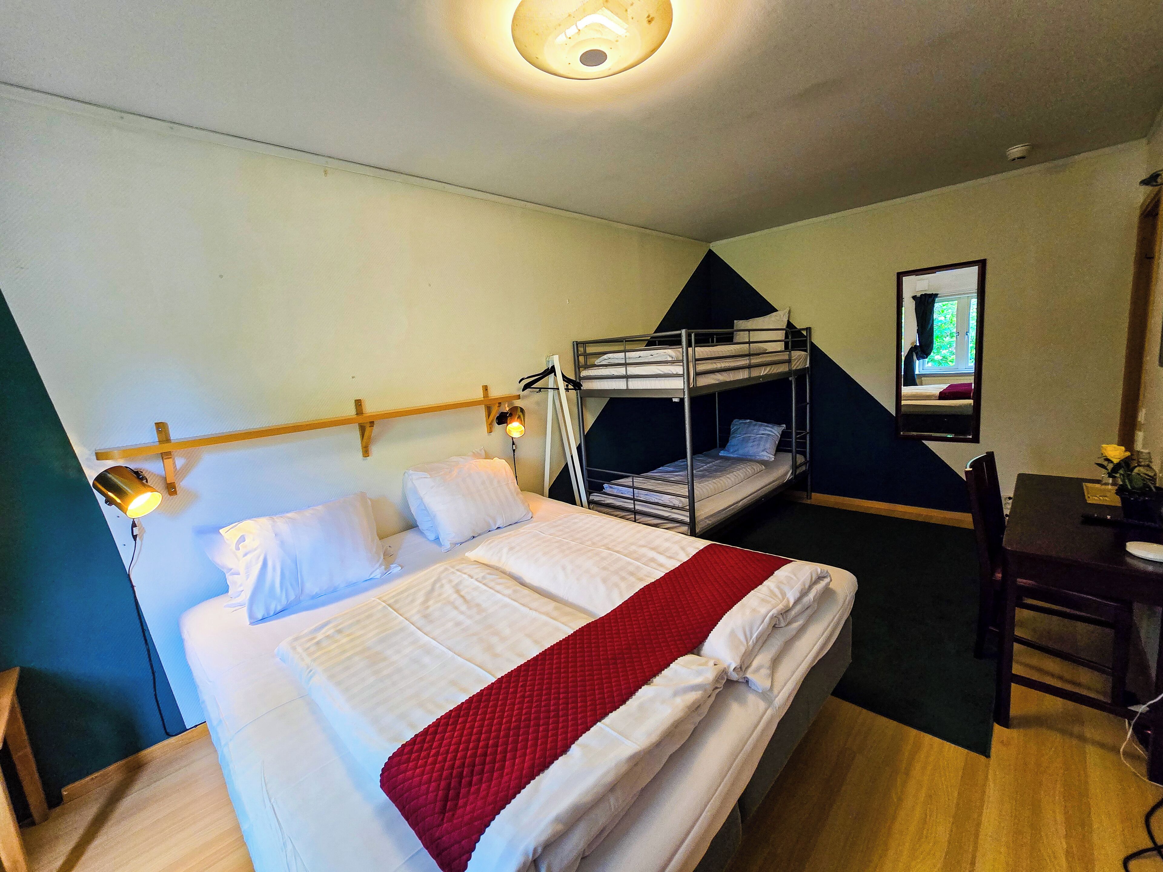 Memory foam beds, individually furnished, desk, laptop workspace