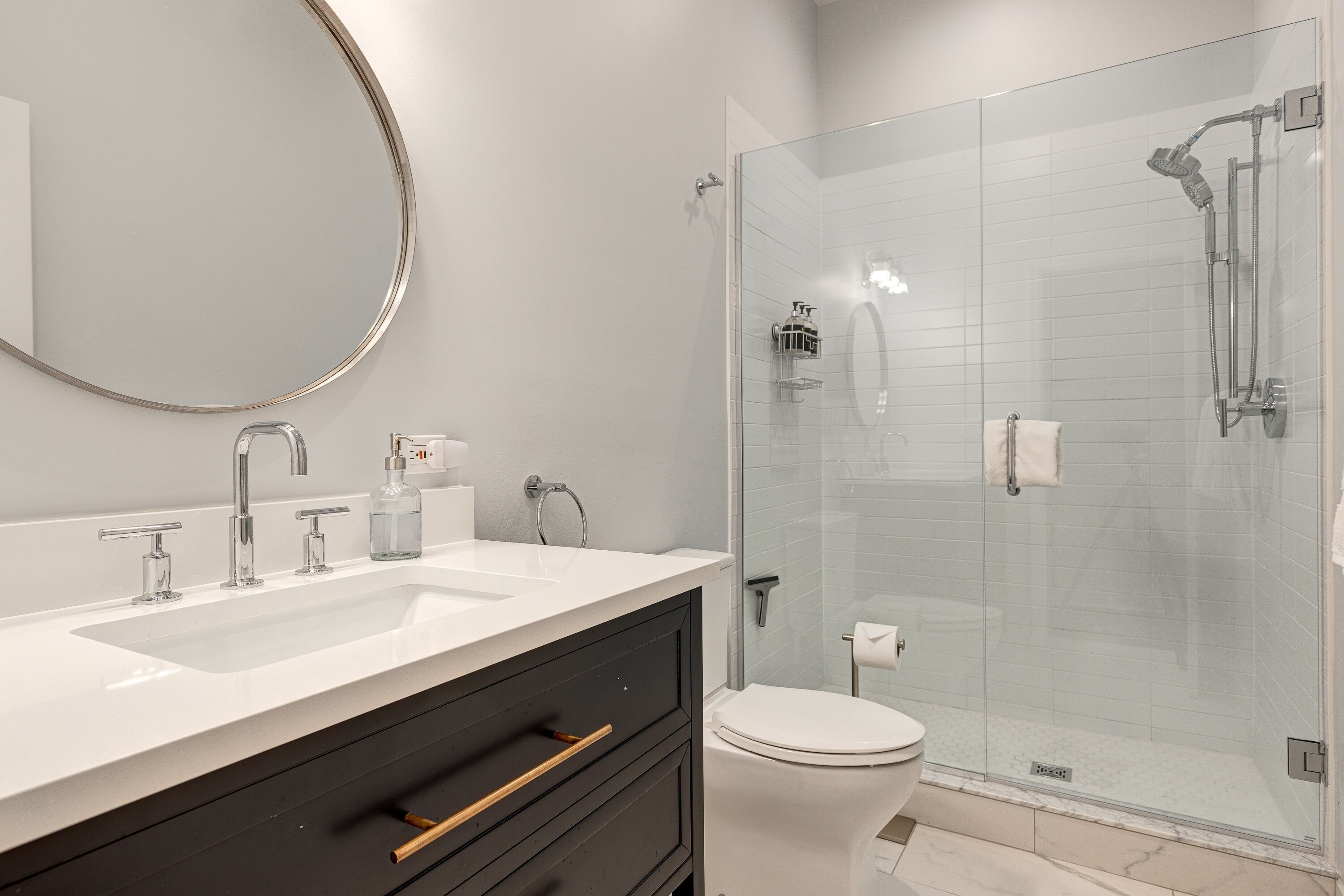 Shower, hair dryer, towels