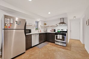 Fridge, microwave, oven, dishwasher - Bucktown Condo Just Two Blocks from the L by AllSet Turnover (Chicago)