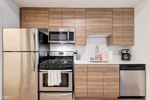 Fridge, oven, coffee/tea maker, toaster