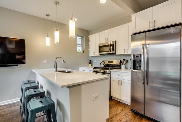 Fridge, microwave, oven, dishwasher - Go Out or Stay In... This Property Has Everything You Need for a Perfect Visit - Just Steps from Humboldt Park by AllSet Turnover (Chicago)