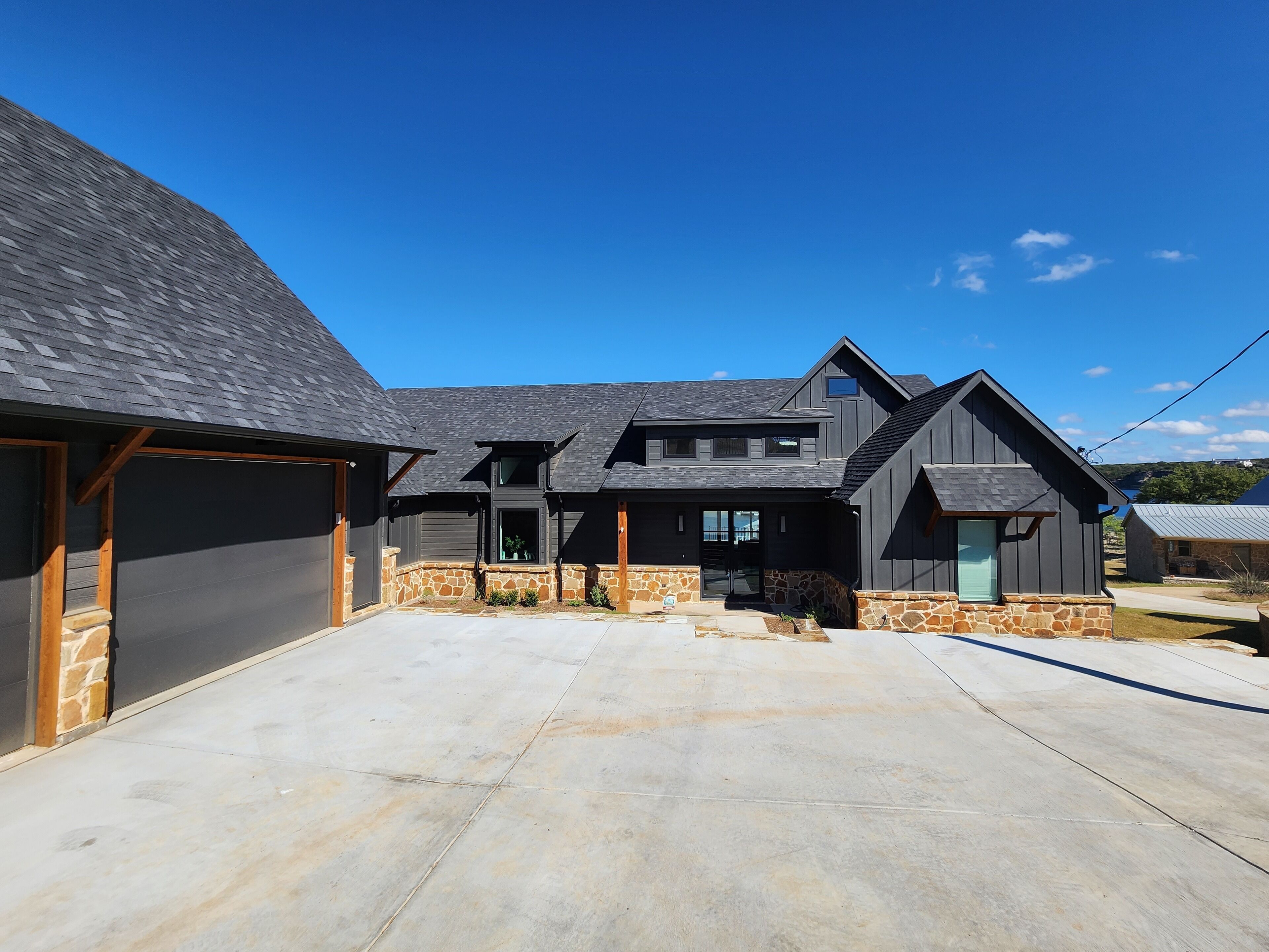 New, Modern open floor plan in quiet cove with dock, pool and basketball court 