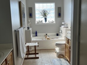 Combined shower/bathtub, hair dryer, towels, soap